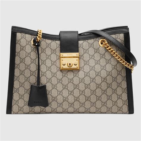 gucci portachiavi supreme|GG Supreme Padlock Medium Shoulder Bag With Black Details.